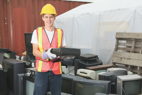 Workers wearing PPE at the start of a clearance job
